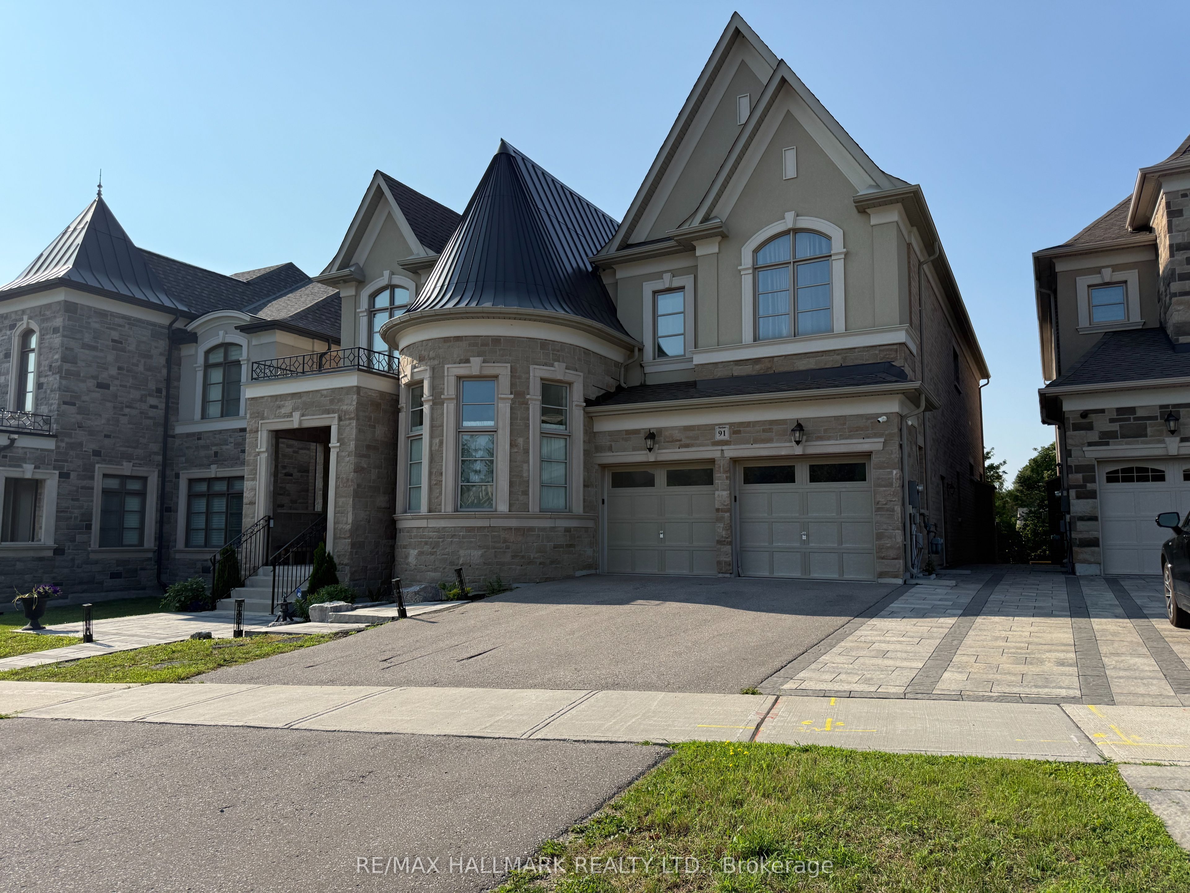 Unit Lower Level - 91 Glensteeple Trail, Aurora 1